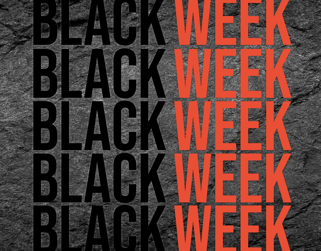 Dunkler Schieferhintergrund mit Schrift Black Week darauf